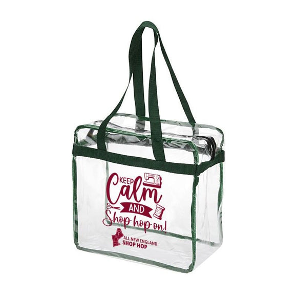 2023 All New England Shop Shop Clear Zip Top Box Tote This is great for hoppers and quilters to keep WIP (works in progress). Size: 12” H x 12” W x 6” D Handles: 24” Green Trim with Maroon imprint