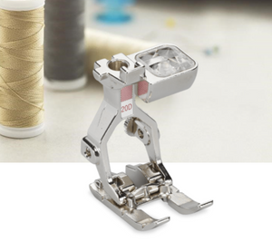 BERNINA Open Embroidery Foot #20D Clear view of the embroidery of attractive appliqué designs Allows lines and patterns to be followed precisely An open form for a clear view of the project For 9 mm machines with BERNINA Dual Feed system