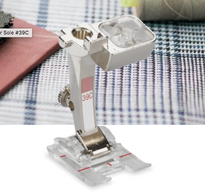 BERNINA Embroidery Foot #39C with Clear Sole Ideal for buttonhole seams, appliqués and decorative stitches Superb effects achieved by couching perle yarns Sewing off-the-edge scallops and raised effects Clear view of the embroidery area For 9 mm machines